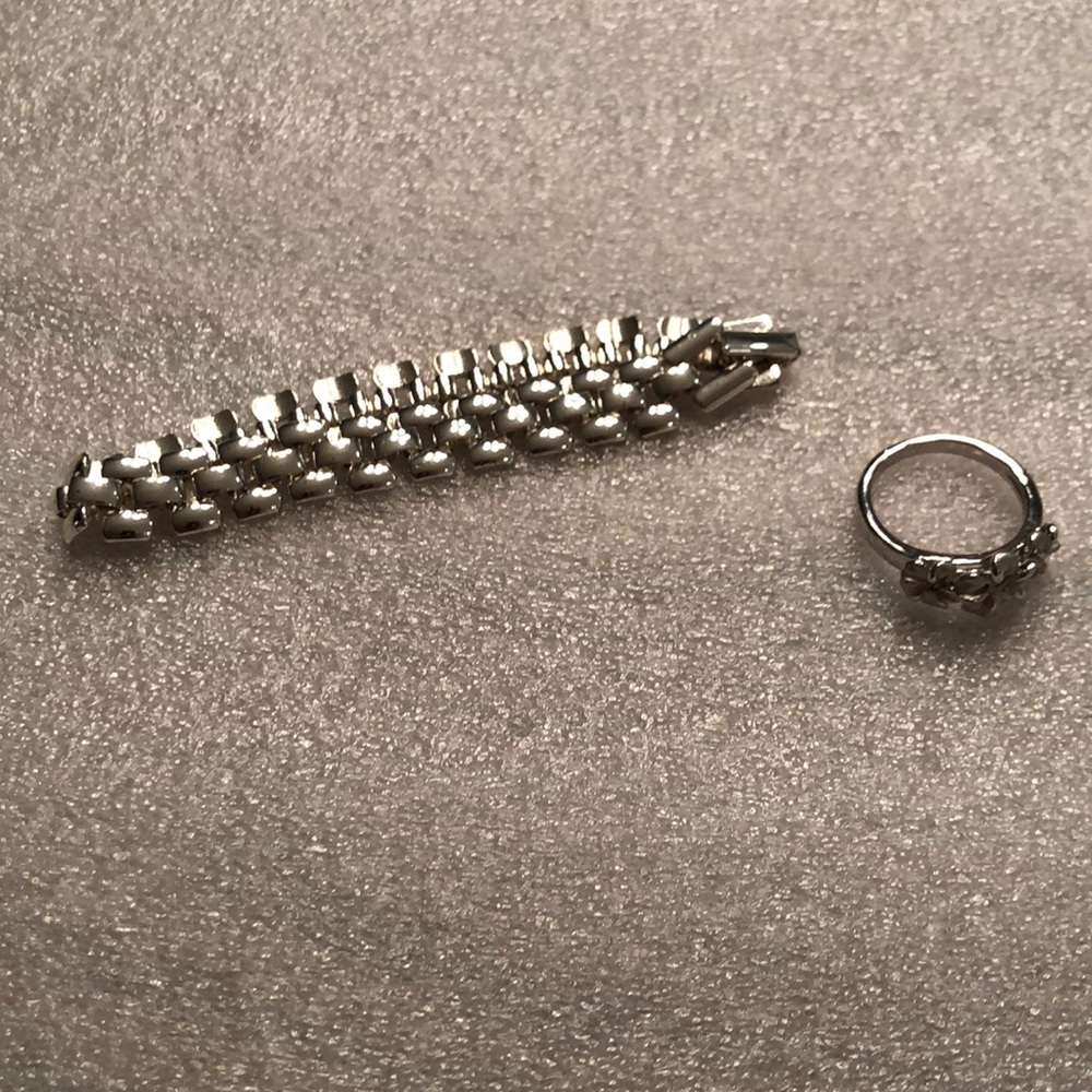 EUC fashion silver bracelet and floral ring.